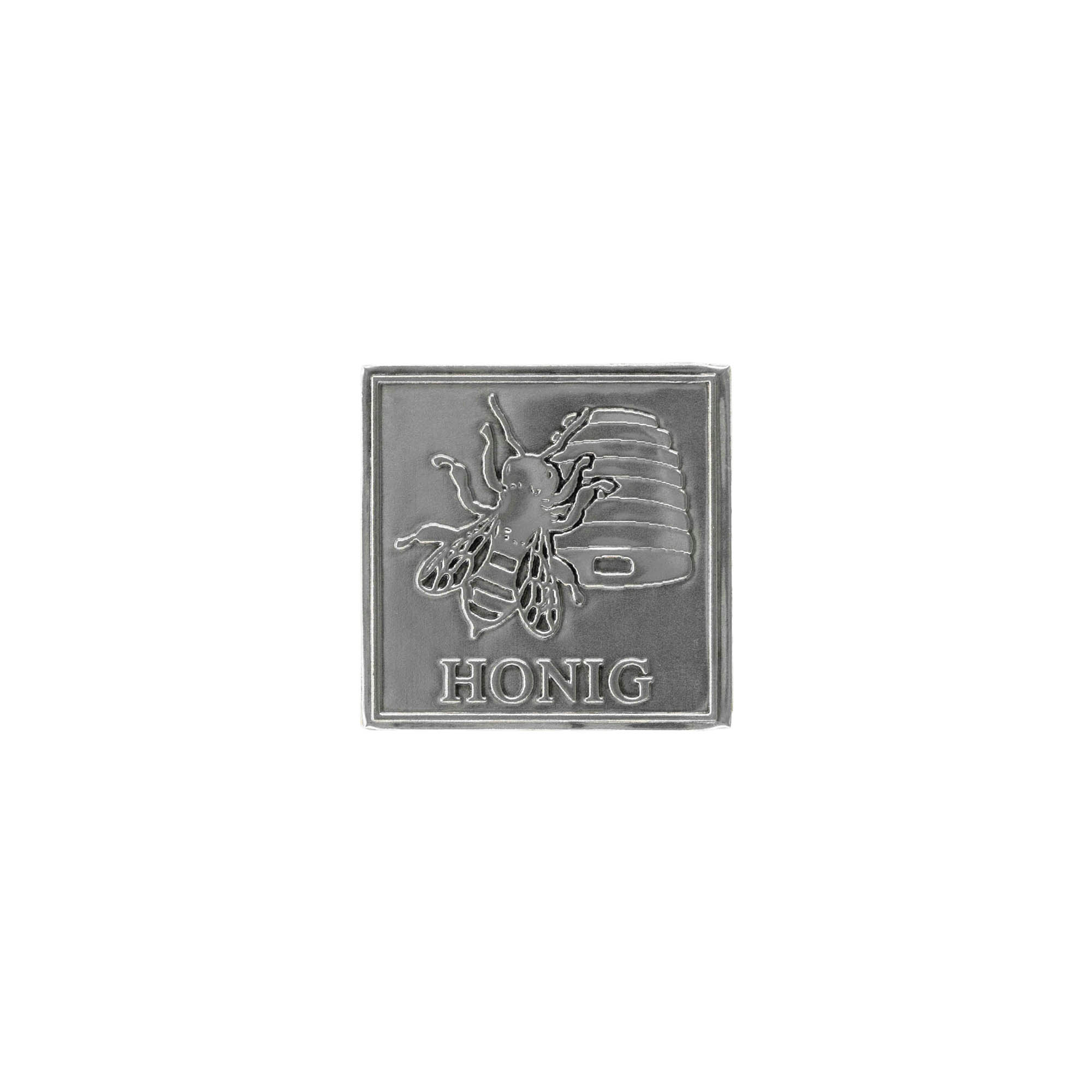 Tinmærke 'Honig', firkantet, metal, sølv Tinmærke 'Honig', firkantet, metal, sølv