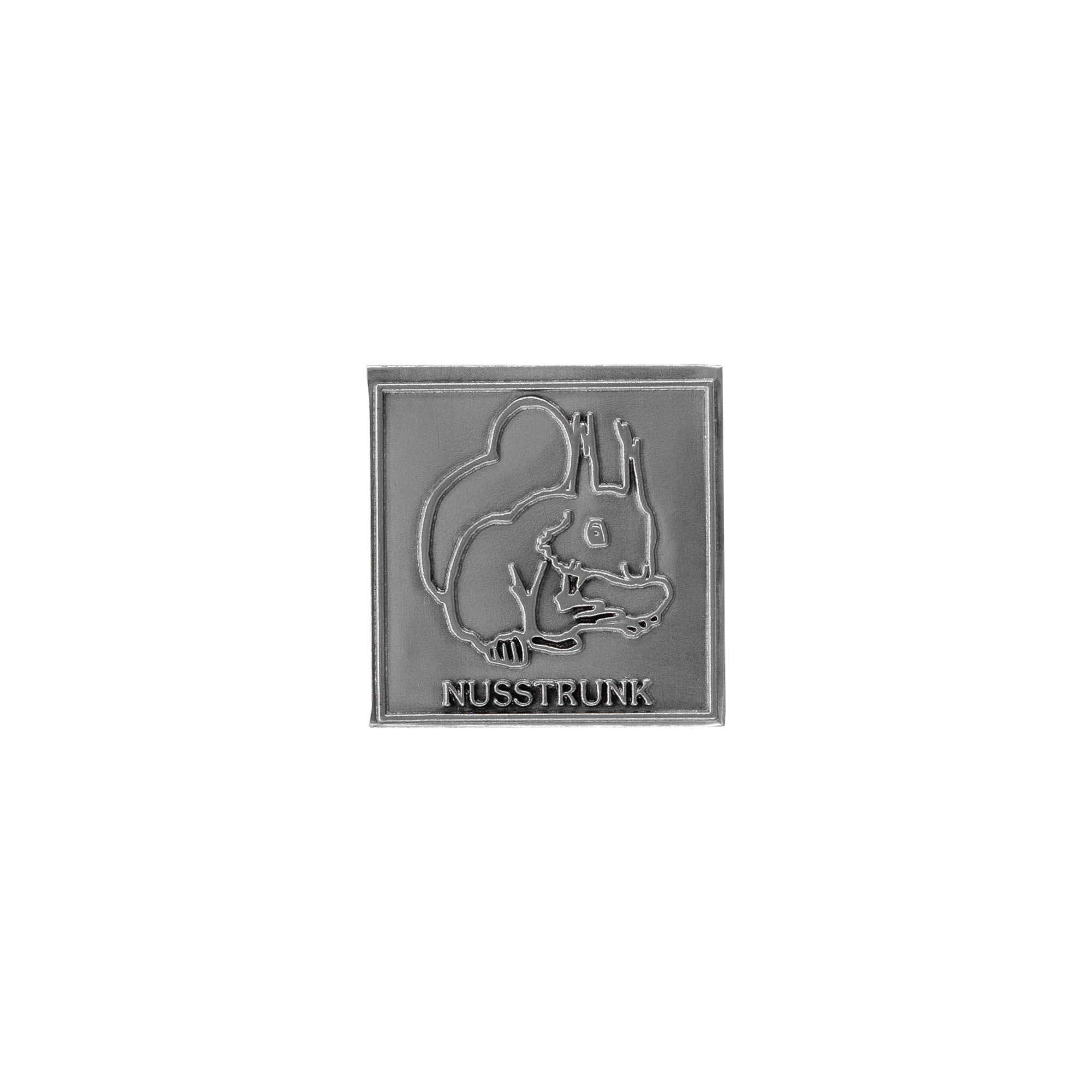 Tin-etiket 'Nusstrunk', firkantet, metal, sølv Tin-etiket 'Nusstrunk', firkantet, metal, sølv